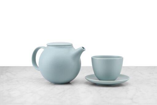minimalist mint teapot and matching cup and saucer